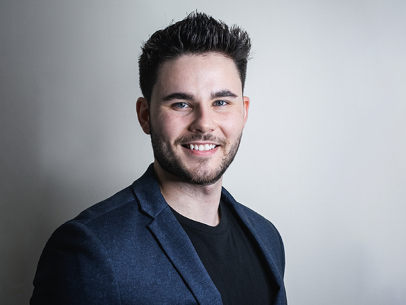 A portrait image of local Toronto real estate agent Marco Pedri, broker with Shoreline Realty Corp., Brokerage.