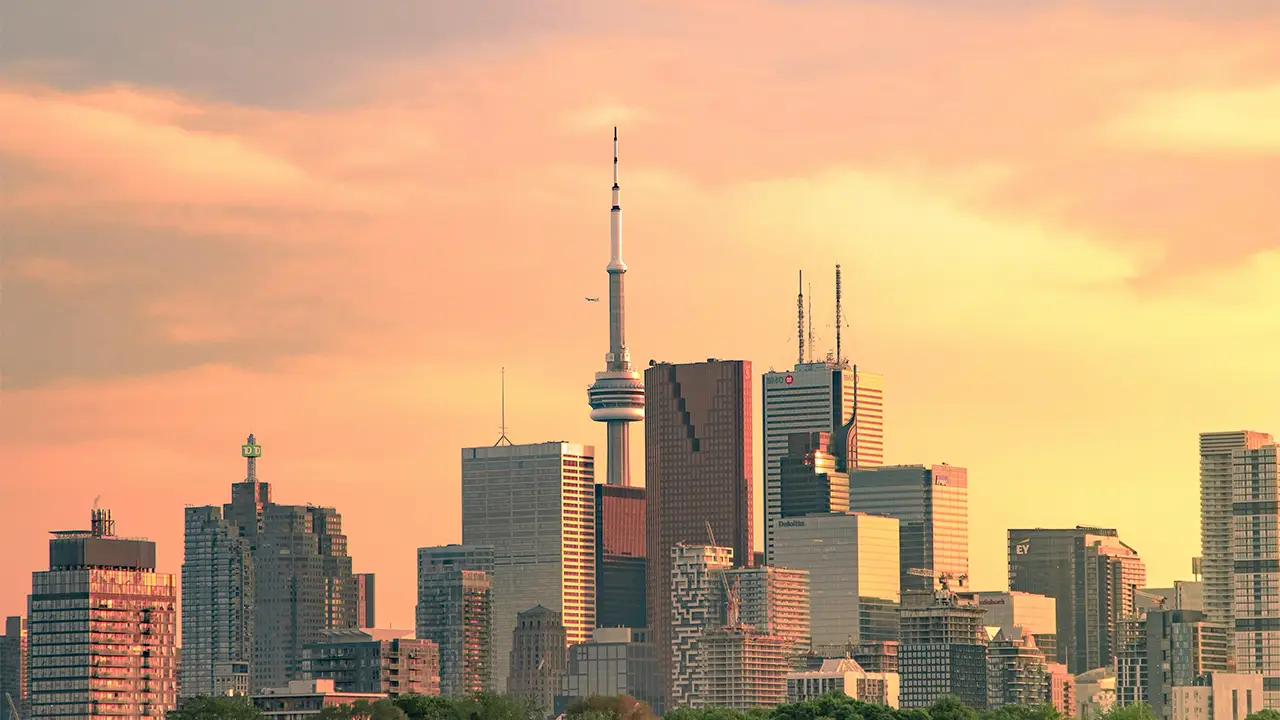 An image of the Toronto skyline with condos and buildings.