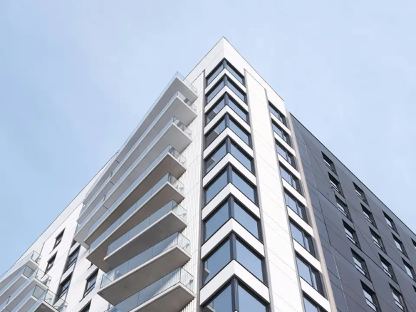 Mistakes to avoid when buying a condo in Toronto, including reviewing condo fees, status certificates, and building conditions.
